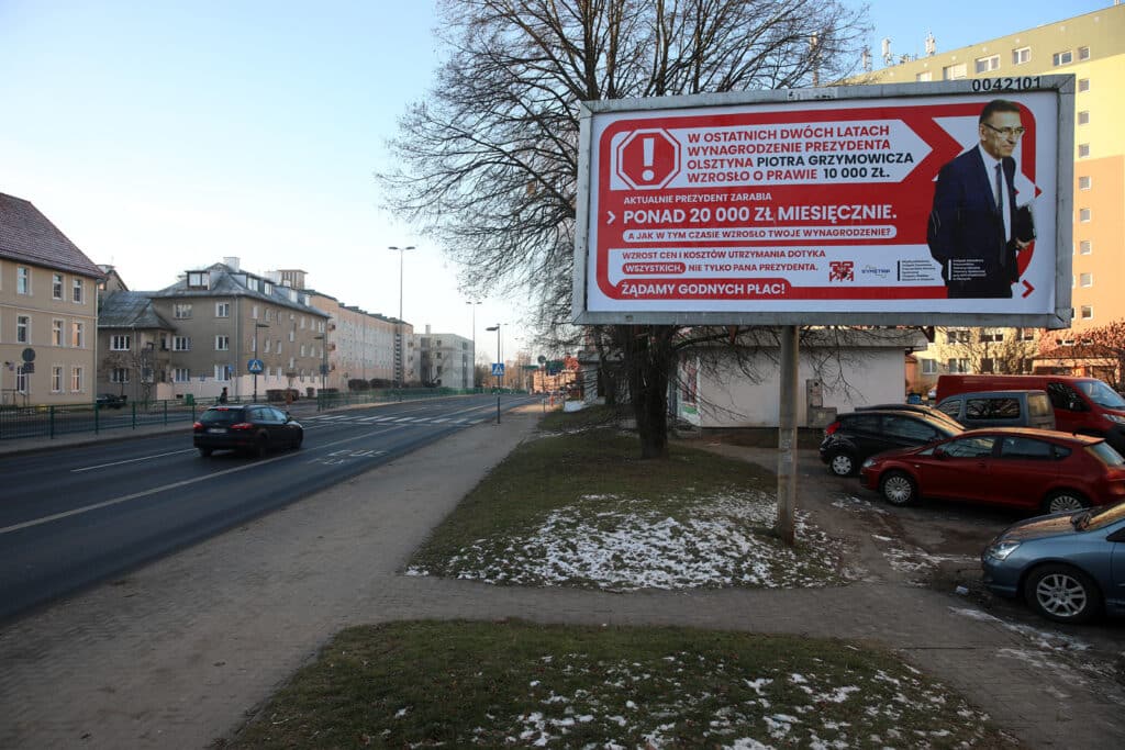 Pracownicy ratusza uderzają w swojego szefa. Prezydent Grzymowicz na billboardzie polityka Olsztyn, Wiadomości