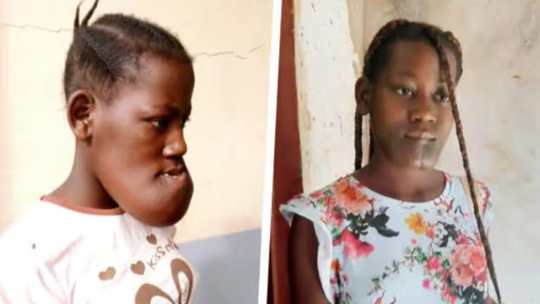 Dwie dziewczynki z Afryki stoją w pomieszczeniu, jedna z nich wygląda na zmartwioną, druga spokojna.