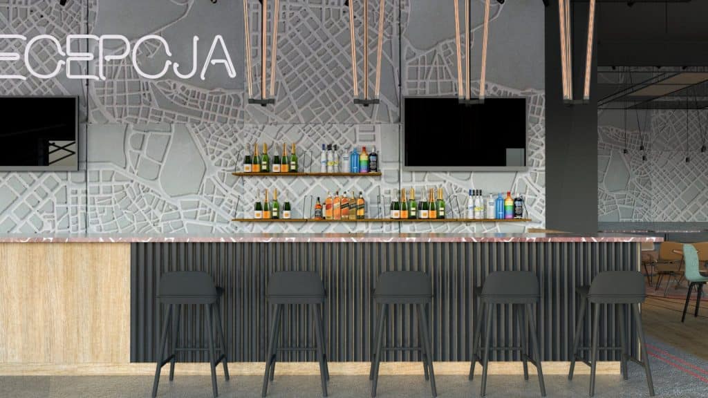 Widok na nowoczesny bar w hotelu z mapą Olsztyna na ścianie w tle.