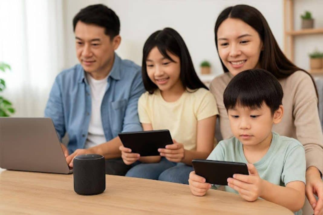 Rodzina korzysta z urządzeń elektronicznych w domu, relaksując się razem.